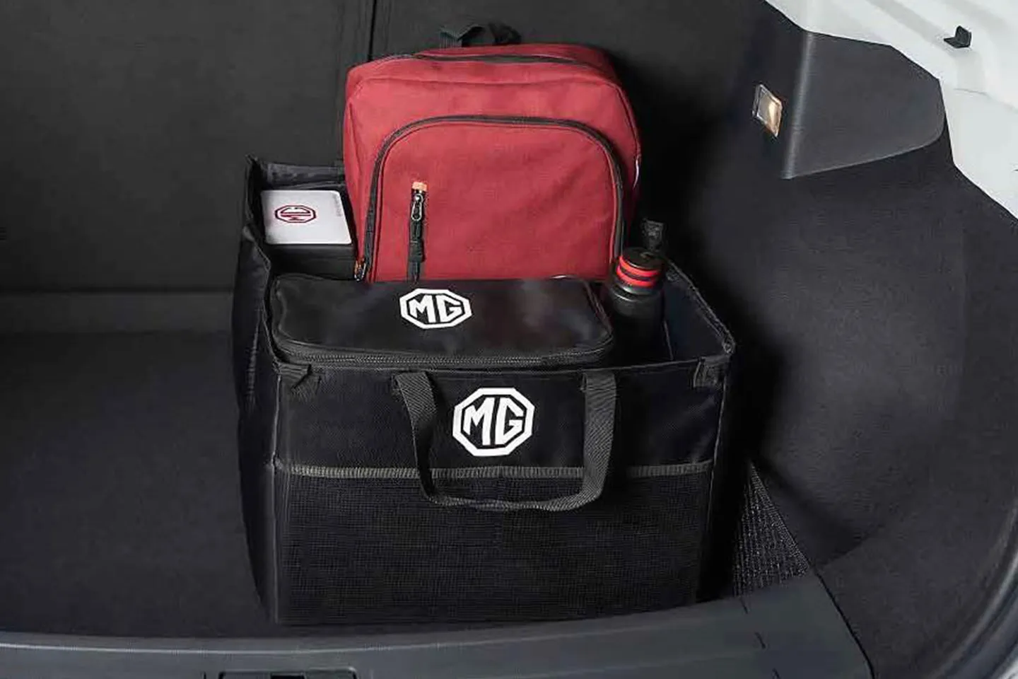 https://mgmotor.sfo2.digitaloceanspaces.com/storage/accesorios/generales/mg-generales-organizador-de-cajuela.webp